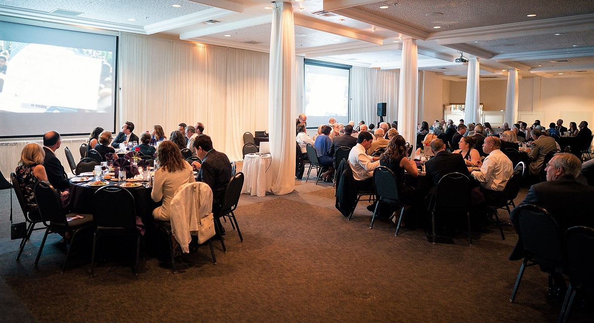 Guests watch LFSA Promotional Video during dinner. Video Gala